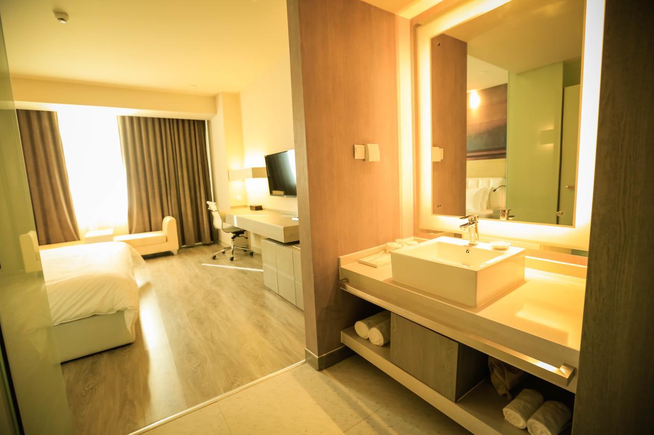 Metropolo Jin Jiang Hotels Turpan Administrative The Heart Of Pai 外观 照片